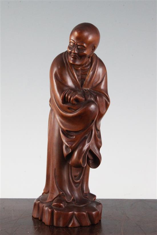 A Chinese boxwood standing figure of Luohan, 23.5cm